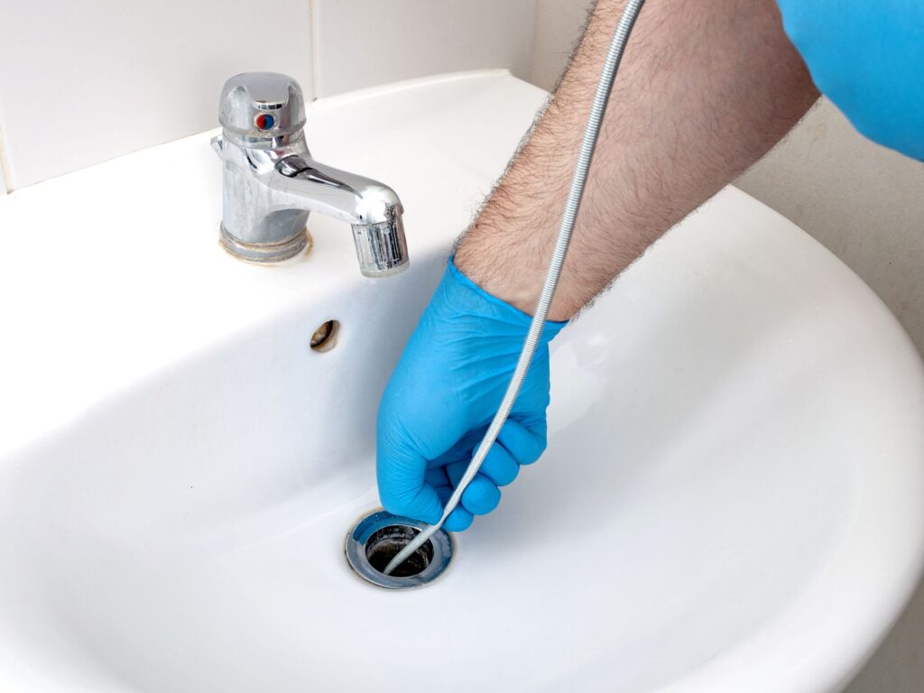 drain auger into sink